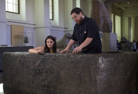 Senior-Conservator-Stephanie-Vasiliou-and-Conservation-Student-Shoun-Obana-cleans-‘The-Enchanted-Basin-in-Room-4